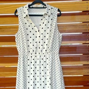 Used Black and White dotted sleeveless collared dress by Maison Jules. Size L